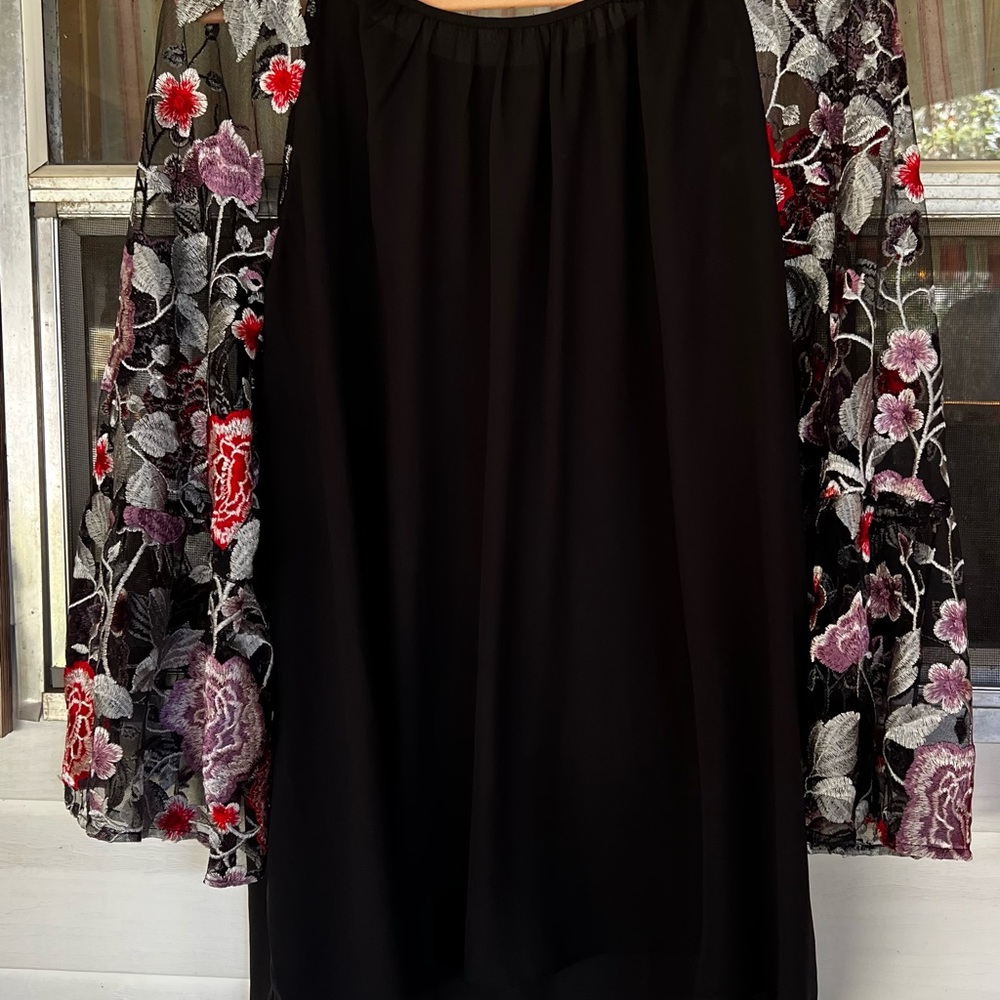 Black Cato 26/28 shirt with sheer embroidered flower sleeves.